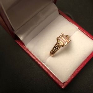 Solid 10k gold ring emerald cut pink topaz.